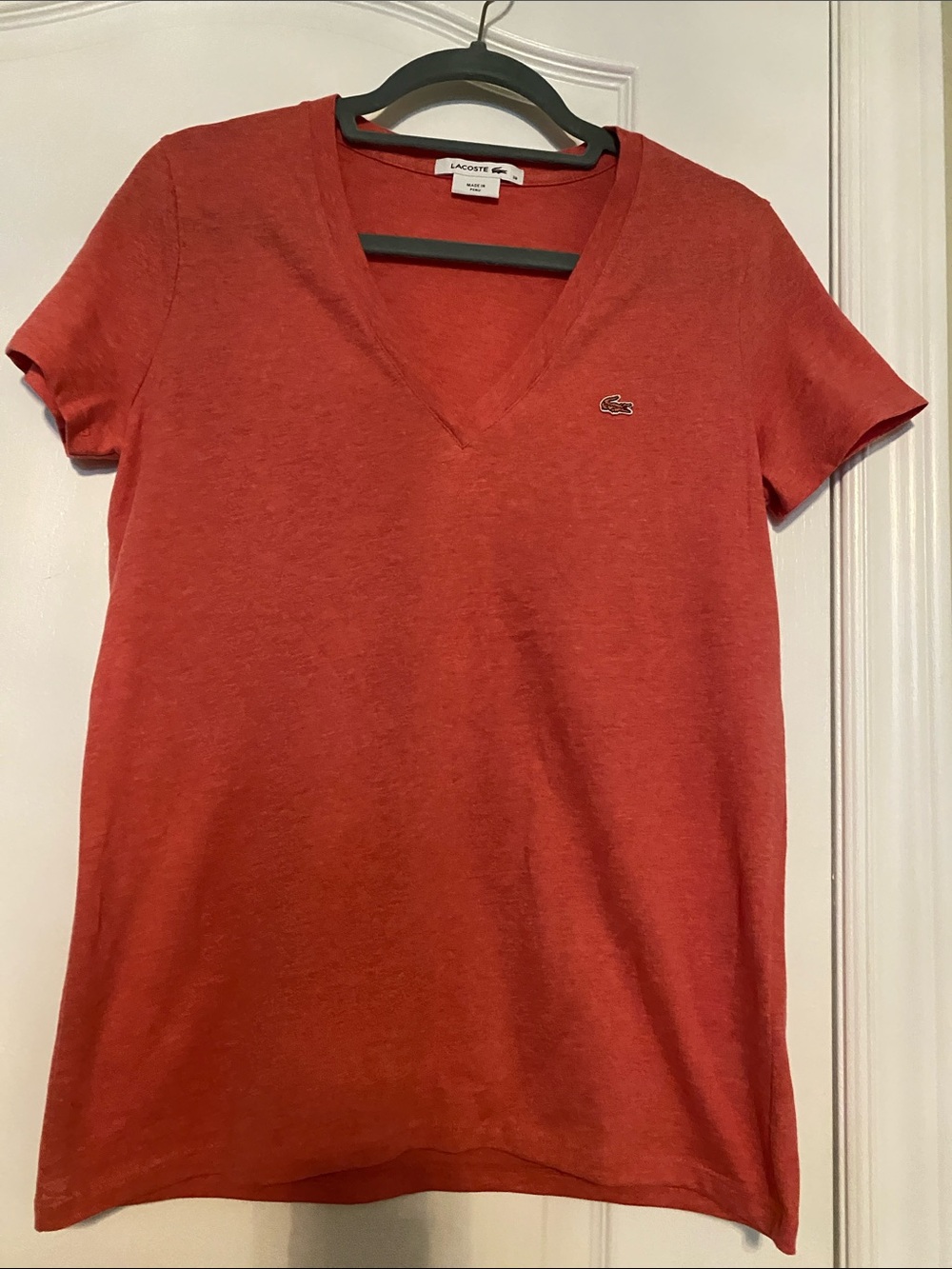 Lacoste Short Sleeve V‑Neck Tee in Coral